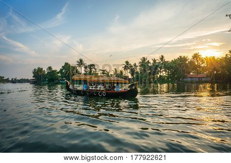 Boat At Sunset In India