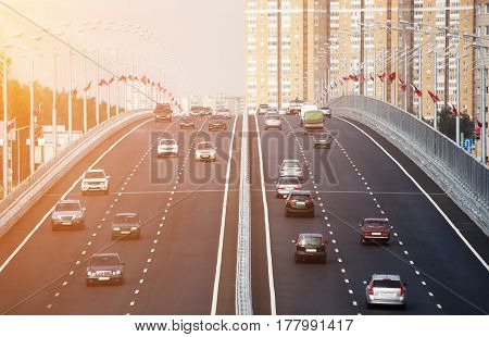 Traffic on the elevated road at sunset