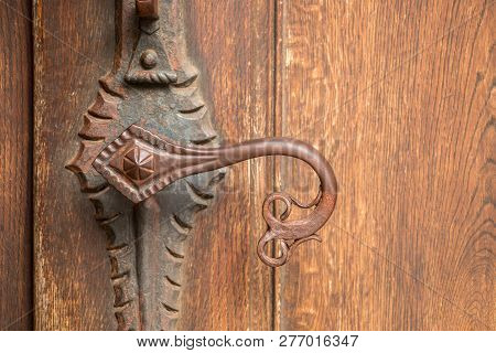 Door Handle Of An Old Historical Building Made Of Iron