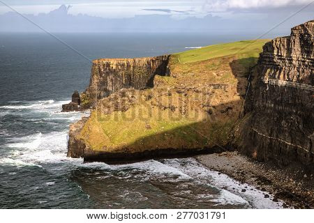 Rocks And Beach At Cliffs Of Moher