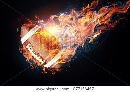 American Football Game. Soccer Ball Enveloped By Fire. The Concept Of Sport, Wrestling, Speed, Oppos