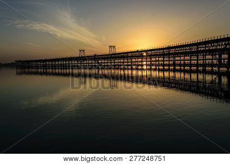 Sunset Over The Rio Tinto Pier, Huelva, Andalusia, Spain
