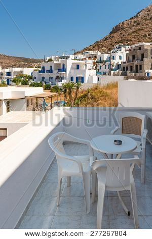 Sifnos, Greece - September 10, 2018: Table With Chairs On The Terrace Of A Summer Villa In Kamares V