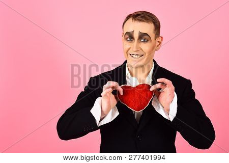 Big Hearted. Happy Mime Falling In Love. Mime Man Hold Red Heart For Valentines Day. Mime Actor With