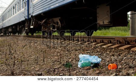 Rubbish On The Railway Thrown Out Of The Train Window, Pollution, Railway And Litter