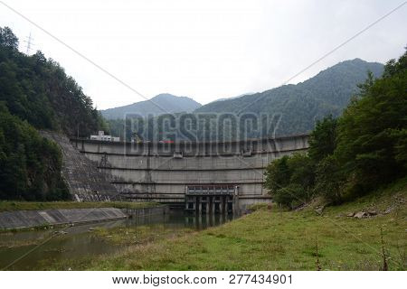 Bradisor Dam Is A Large Hydroelectric Dam On The Lotru River Situated In Romania.