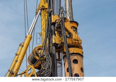Concrete Drilling Machine. Hydraulic Drilling Machine Is Boring Holes In The Construction Site For B