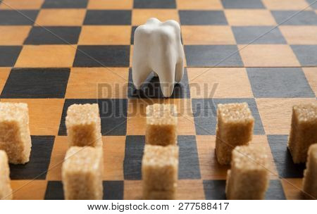 Fight For Health Between Cane Lump Sugar And White Tooth Figure On Chessboard