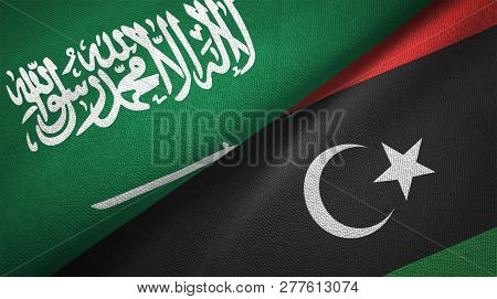 Libya And Saudi Arabia Two Flags Textile Cloth Fabric Texture