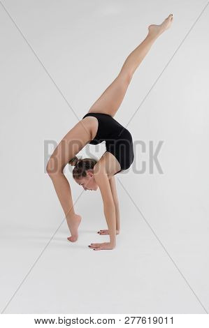 Beautiful Young Woman Limber Exerciser In The Studio