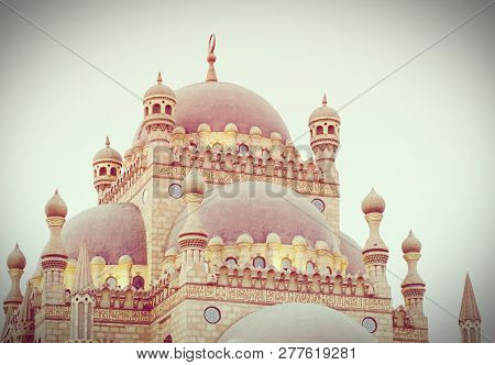 Islamic Background With The Al Sahaba Mosque In Sharm El Sheikh Against Ramadan Dusk Sky And Crescen