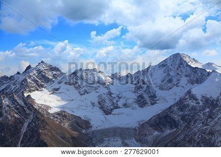 The First Snow On Mount Cheget. Late Autumn In The Caucasus