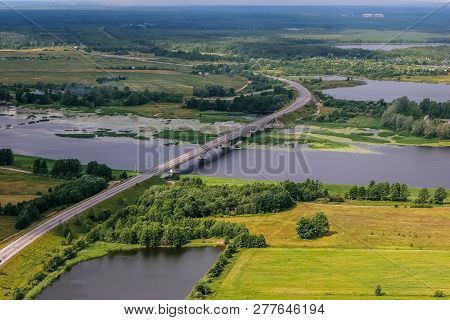 Latvia From Above. Aerial View Of River Lielupe Bridge In Latvia.