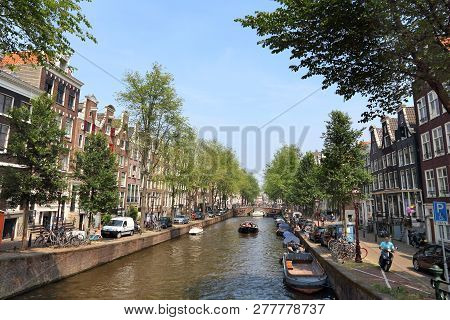 Amsterdam, Netherlands - July 7, 2017: Leidsegracht Canal In Amsterdam, Netherlands. Amsterdam Is Th
