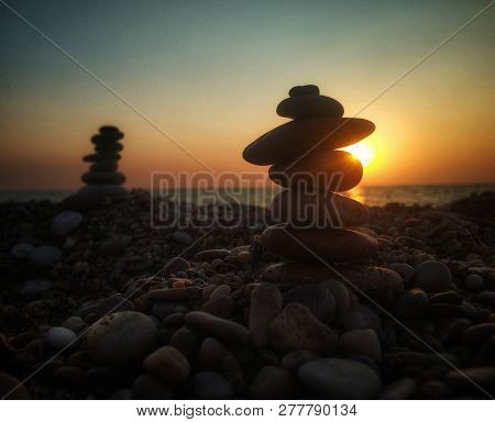 Stones On Sunset. Sea And Sun... Balance & Relaxing.