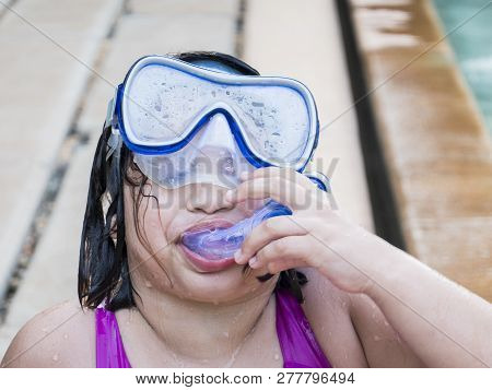 Teenager Funny Girl Wearing Mask Swimming In The Pool. Happy Holiday Concept. Cute Happy Little Boy 