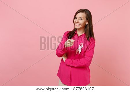 Woman In Rose Clothes With Pink Silk Ribbon Symbol Isolated On Pastel Wall Background, Studio Portra