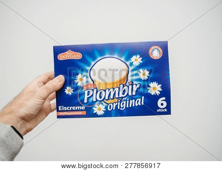 Paris, France - Nov 22, 2018: Man Hand Holding Delicious Traditional Plombir Ice-cream Produced By D