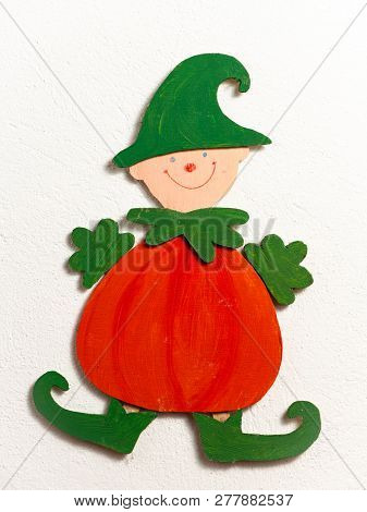 Figure Of A Funny Gnome Made Of Wood By A Child, White Background
