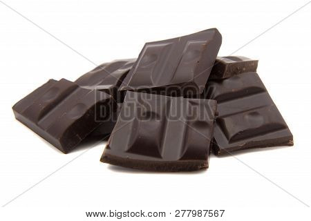 Dark Chocolate Bars Stack On A White Background