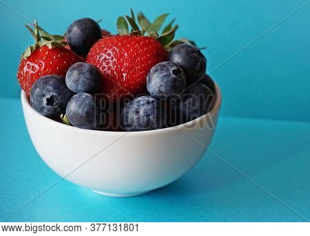 Cherry And Strawberry Keep For Eating On Table