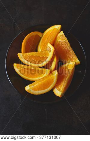 Fresh Pieces Of Orange Fruit Keep On Table