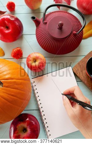 Autumn Mock Up.back To School. Thanksgiving Day. Halloween. Blank White Notebook,hand With Writing P
