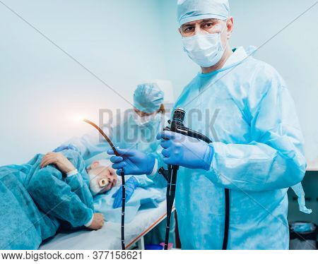 Endoscopy At The Hospital. Doctor Holding Endoscope Before Gastroscopy