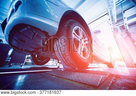 Automotive Suspension Test And Brake Test Rolls In A Auto Repair Service.