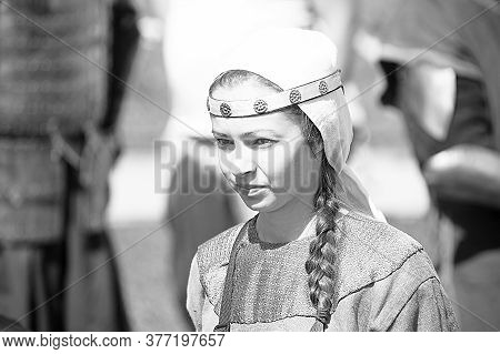 Russia, St. Petersburg 23.06.2012 A Woman In Casual Clothes Of The Vikings At The Historical Reconst