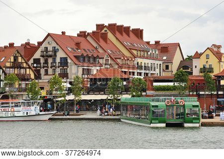 Mikolajki, Poland, July 12: View To City From The Lake On July 12, 2020 At Mikolajki, Poland. Mikola