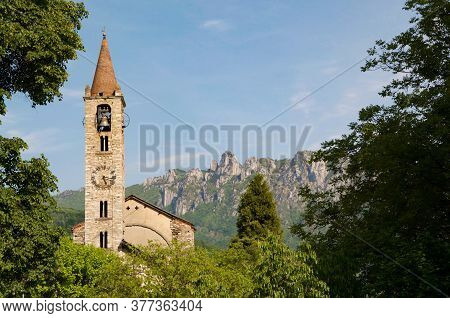 Scenic View Of The Santo Stefano Church Of Tesserete With The Denti Della Vecchia Moutain Range In T