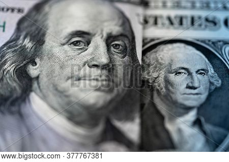 One Hundred Dollars And One Dollar Bills. Closeup Of Benjamin Franklin And George Washington . Us Do