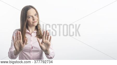 Young Caucasian Woman Gesturing Stop Or Saying No With A Smile, With Flirt And Coquetry, Extending H