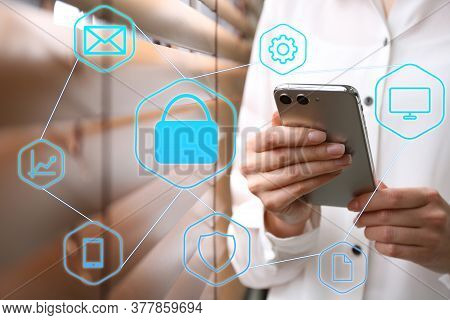 Information Security. Young Woman Using Smartphone Indoors, Closeup