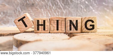 Wooden Blocks With The Word Things. Business And Finance Concept.