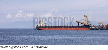Tsawwassen, Bc, Canada - May 19, 2023: Container Ship At The Port Being Loaded For Shipment.