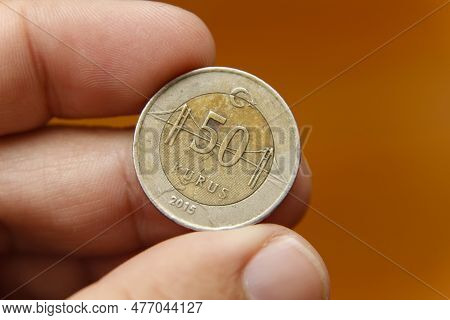 Turkey Fifty Kurus Coin Between Fingers - Turkish Coin Lira