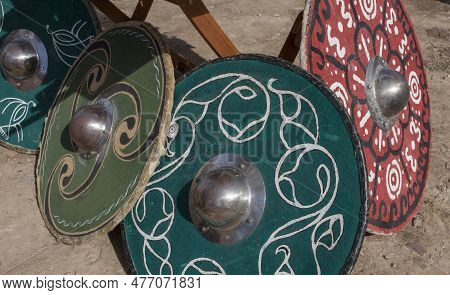 Celtiberian Shield Resting On The Ground, Caetra Replicas. Historical Reenactment
