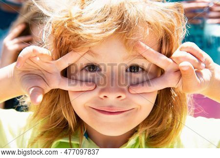 Kids Funny Face. Close Up Portrait Of Fyn Child Making Funny Expressions.