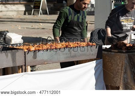 Chisinau, Moldova - October 15, 2022: Street Barbecue. Grilled Chicken Shish Kebab Street Barbecue I