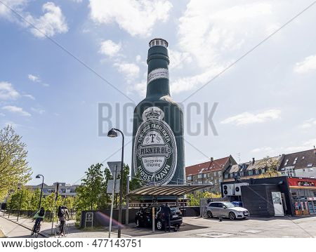 Big Green Bottle Of Tuborg Beer Monument In Copenhagen, Denmark - June 1, 2023.