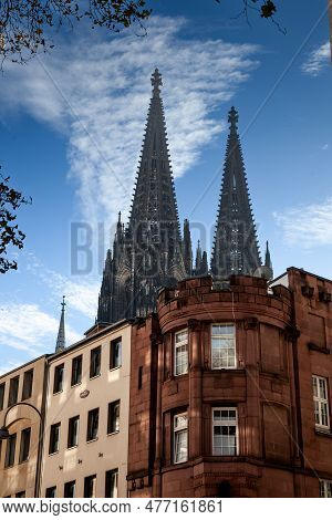 Cologne Cathedral With A Residential Apartment Building In Front With Blue Sky. Cologne Cathedral, O