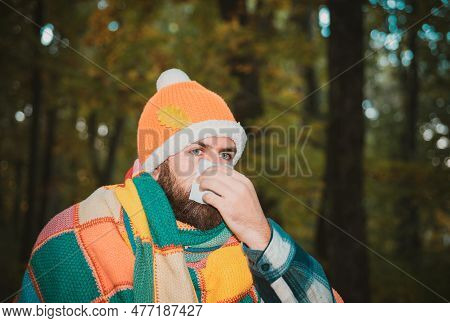 Man Work Out After He Sick Blowing Nose And Sneezing, Coughing. Infected Man Blowing His Nose In Tis