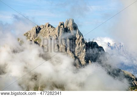 Dolomites Mountains In The Middle Of Clouds, Carnian Alps Mountains, Italy