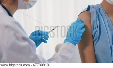Young Woman Visits Skillful Doctor At Hospital For Vaccination . Covid 19 And Coronavirus Vaccinatio