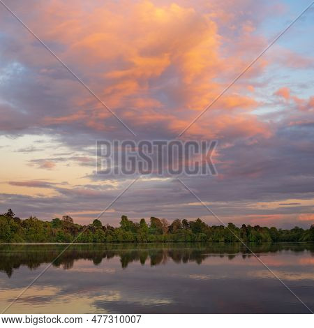 Sunset Panorama Of The Lake Shore Of The Mere With A Perfect Lake Reflection In Ellesmere In Shropsh