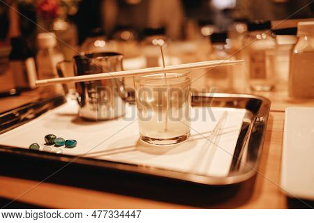 Set For Crafting Candle On Metal Tray. Installing Cotton Wick. Glass And Transparent Container. Soli