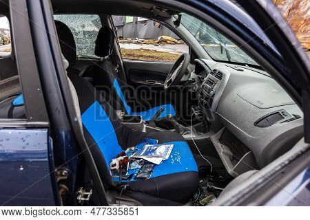 Hostomel, Kyev Region Ukraine - 09.04.2022: Shot Cars. On The Streets Of Irpin. Cities Of Ukraine Af