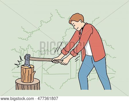 Strong Man Cutting Wood With Axe In Forest. Guy Splitting Wood Logs In Nature. Camping And Woodcutti